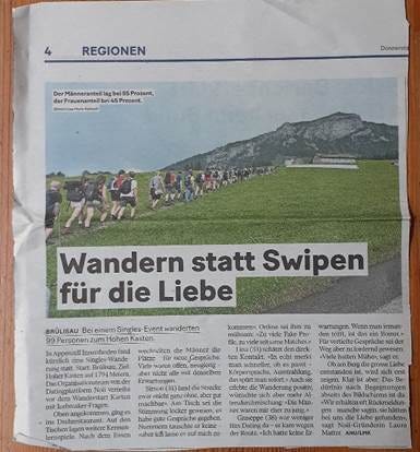 A newspaper with a group of people walking on a hill

AI-generated content may be incorrect.