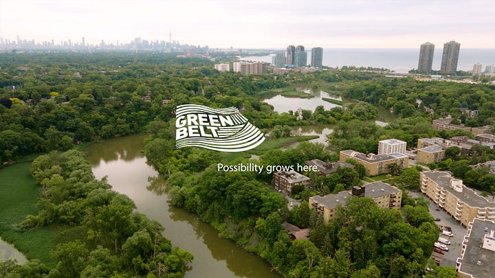 Aerial photo of the Humber River with downtown Toronto in the background. The Greenbelt Foundation logo in the centre.