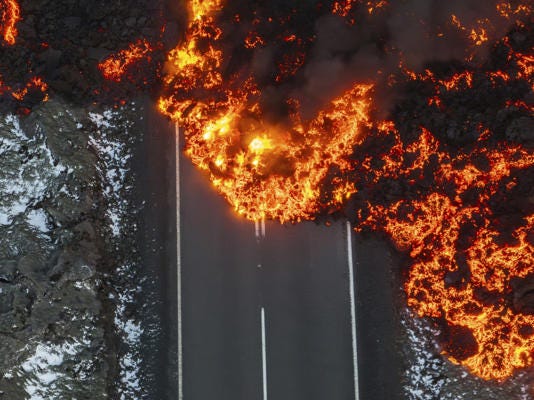 Lava on the road, Grindavik, Iceland, November 21, 2024. Steady volcanic activity continues to approach the iconic Blue Lagoon resort on Iceland's Reykjanes Peninsula, following the eruption last week. Marco di Marco/ASSOCIATED PRESS