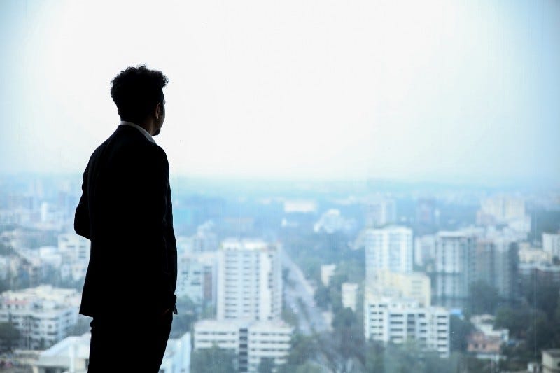 A person looking over the buildings