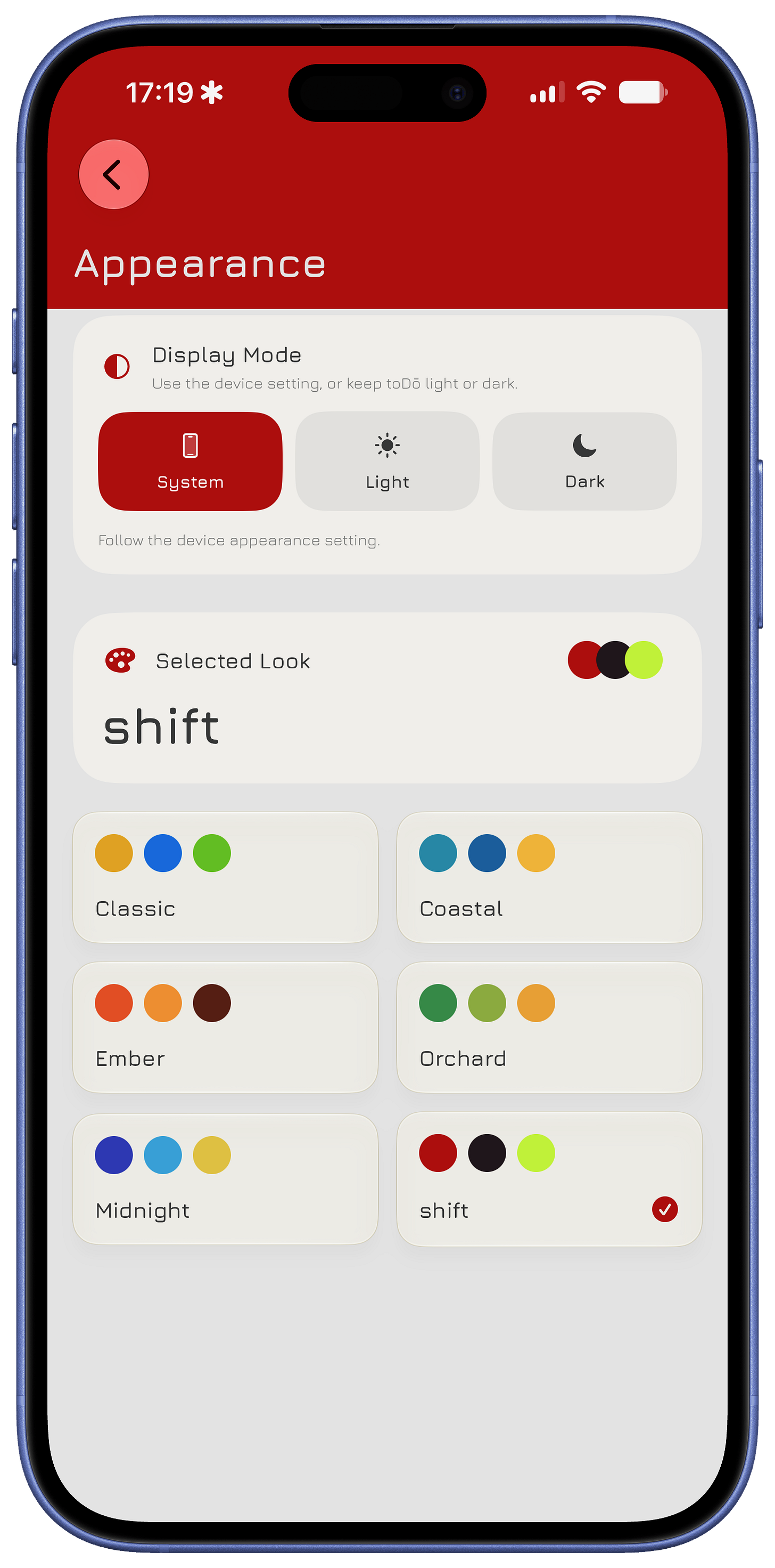 toDō Appearance settings on iPhone showing System, Light, and Dark display modes and theme choices including Classic, Coastal, Ember, Orchard, Midnight, and the selected shift theme.