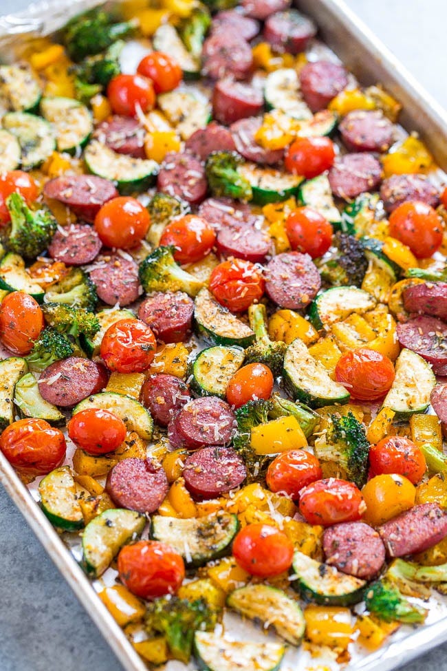 Sheet Pan Sausage and Veggies — This sheet pan sausage dinner can be made with your pre-cooked sausage of choice and is done in under an hour. Plus, this recipe is super customizable! Sheet Pan Sausage and Veggies — This sheet pan sausage dinner can be made with your pre-cooked sausage of choice and is done in under an hour. Plus, this recipe is super customizable!