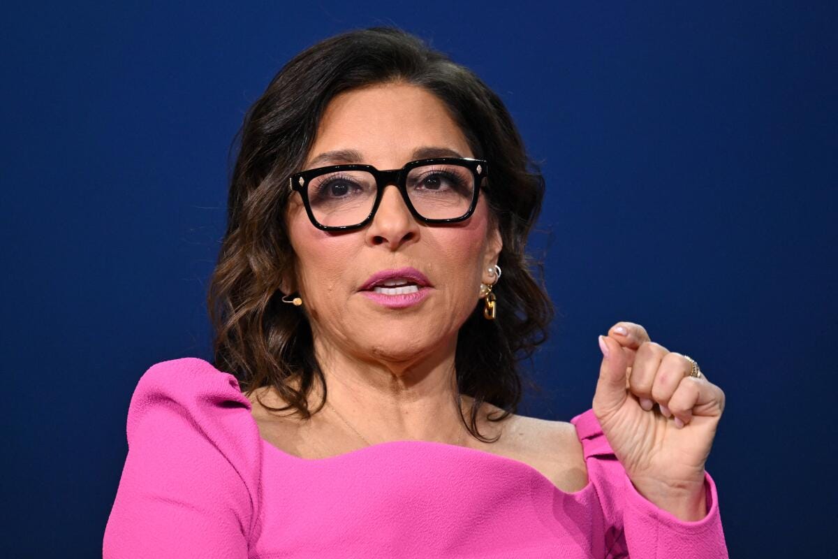 Linda Yaccarino speaks wearing a pink top.