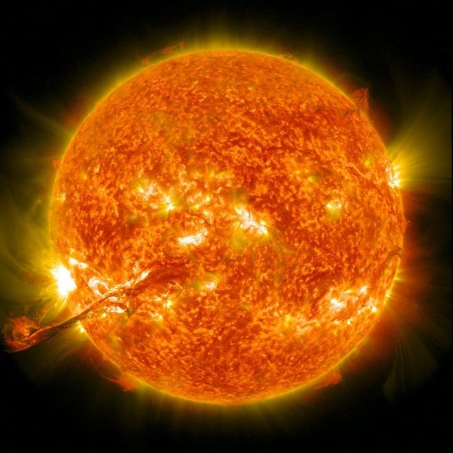 Image of the sun captured by NASA, showcasing its bright surface and solar features