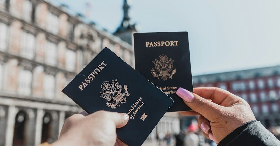 person holding passports