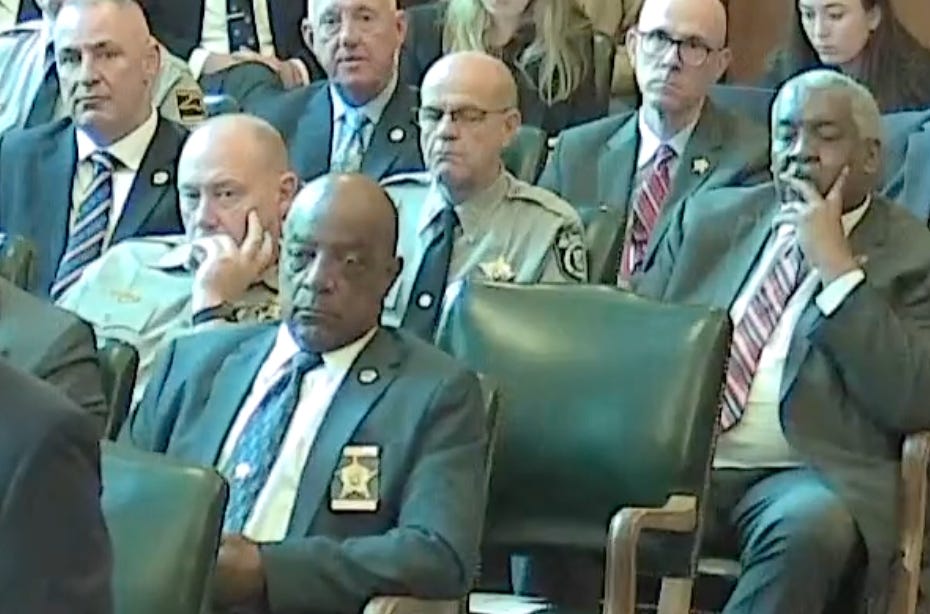 glum-faced officers glum-faced officers