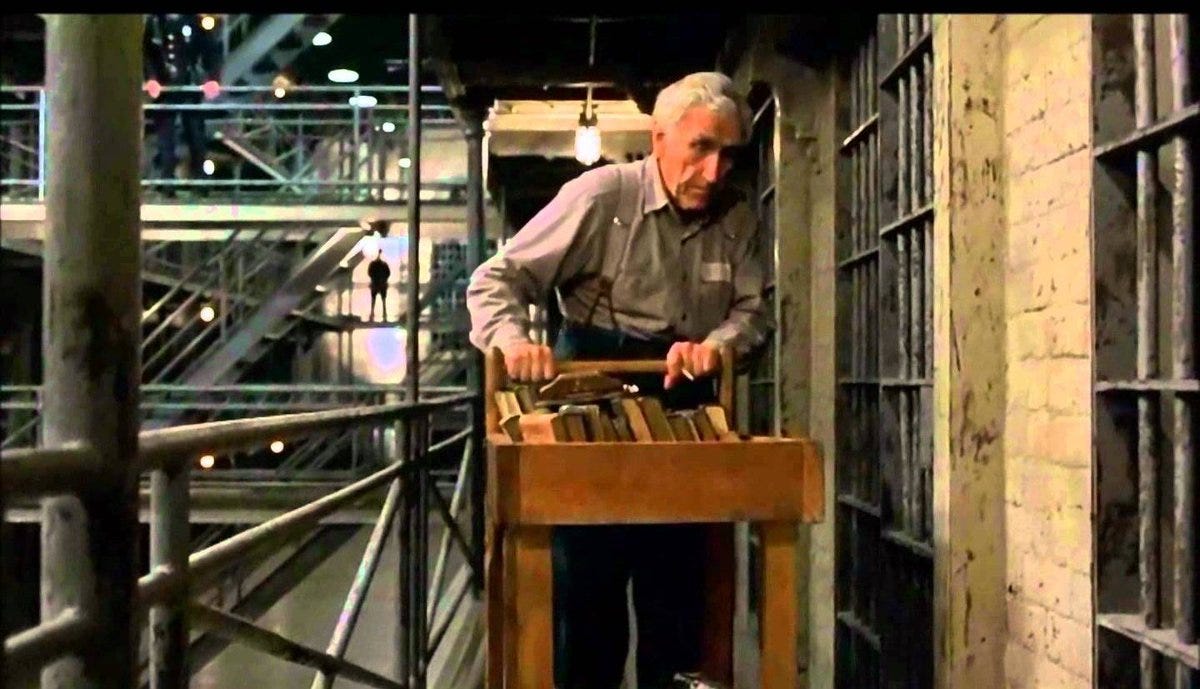 Brooks, the librarian from the shawshank redemption pushing a book cart Brooks, the librarian from the shawshank redemption pushing a book cart