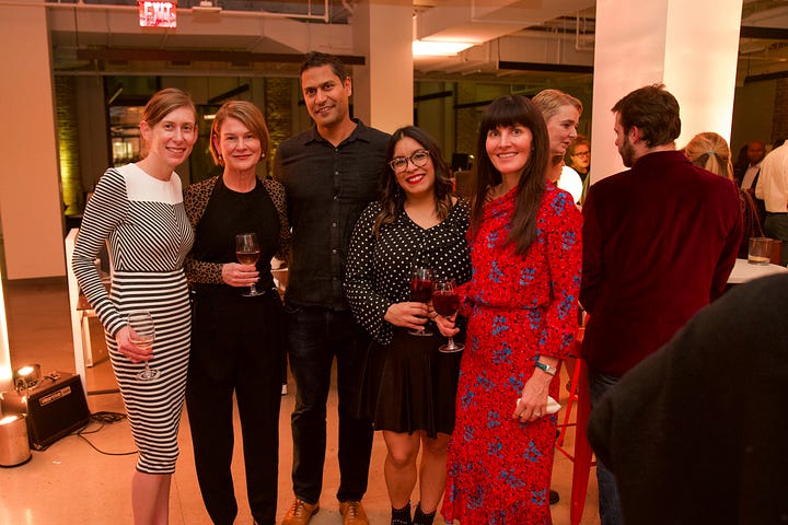 People toasting at a startup launch party on Wall Street in New York City