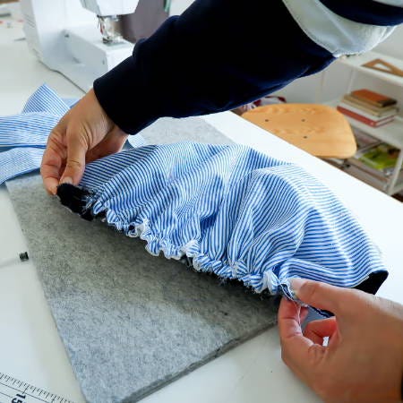 gathered fabric edge, folding and finding the middle point gathered fabric edge, folding and finding the middle point