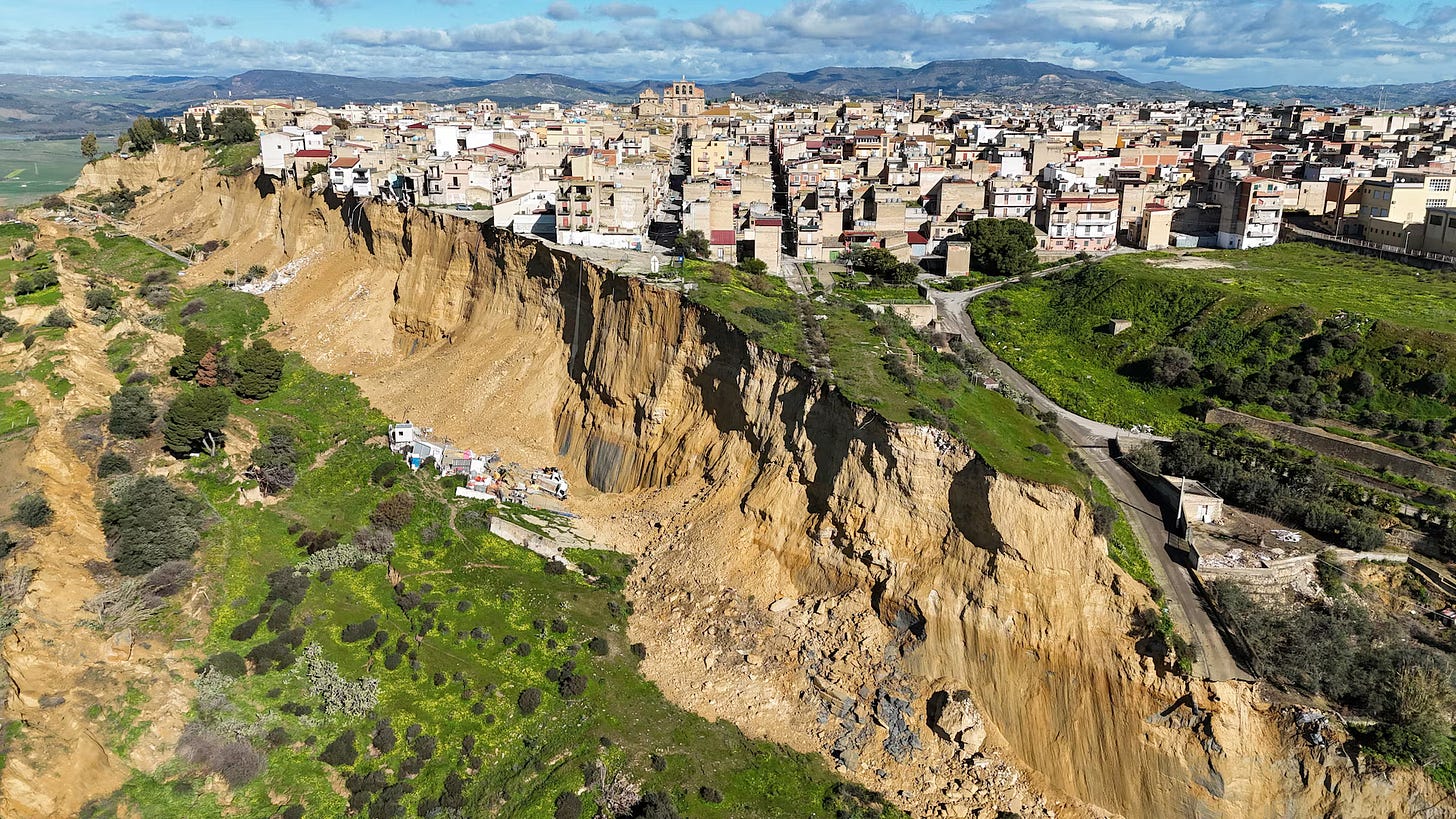 Huge landslide leaves Sicilian homes teetering on cliff edge as 1,500 ...