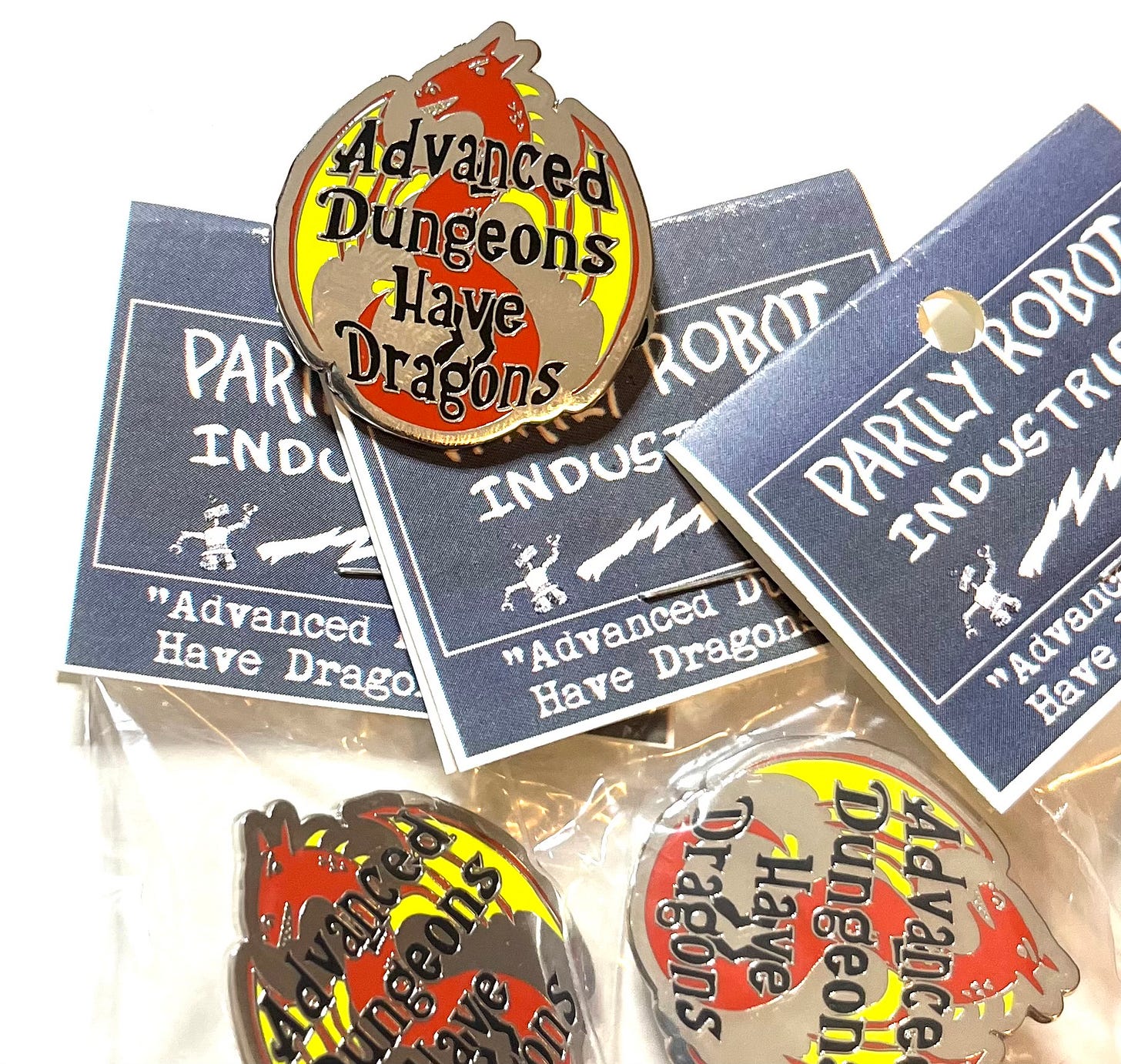 Image of several pins in their packaging.
