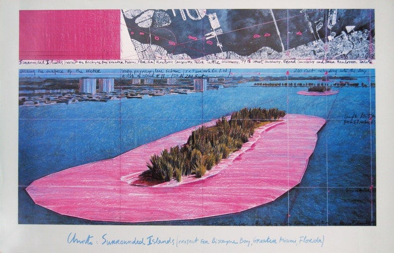 May include: A pink and blue aerial photograph of an island surrounded by water. The island is covered in green trees and shrubs. The image is titled "Christo: Surrounded Islands (project for Biscayne Bay, Greater Miami, Florida)".