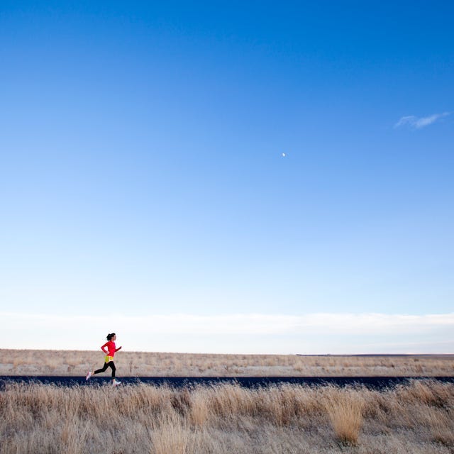 A woman jogging. A woman jogging.