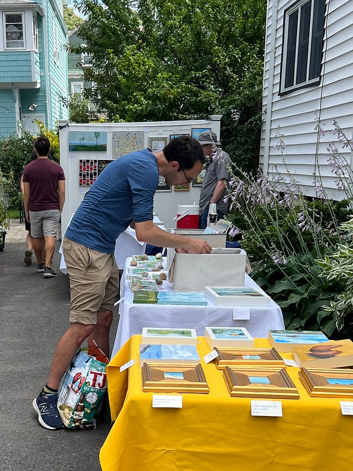 Art shoppers study my work set-up in the driveway of our house as part of the Somerville Yart Sale.