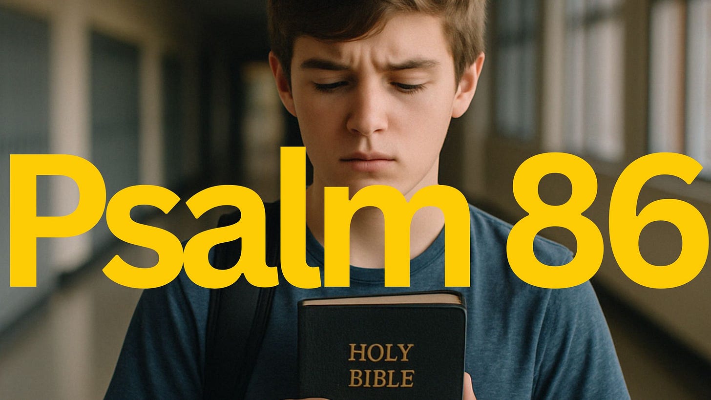 Teenage boy standing in a school hallway holding a Bible with eyes closed in silent prayer.