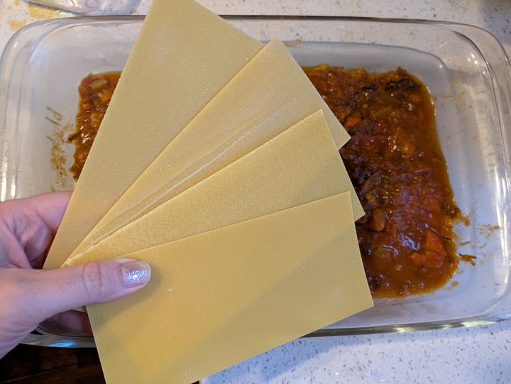 Starting to layer the lasagna. Serving the first finished piece.