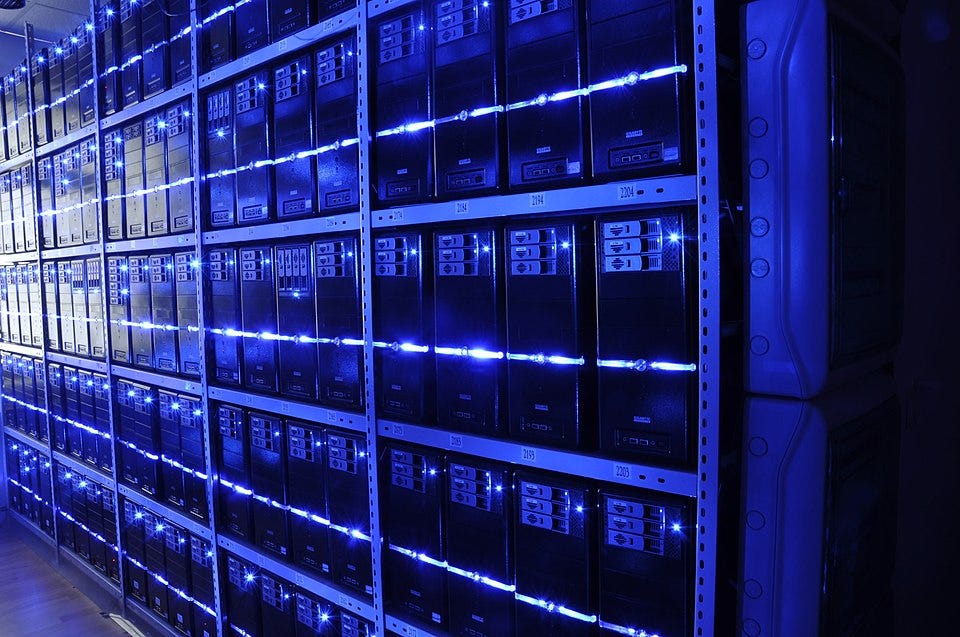 Server room, lit by blue light.