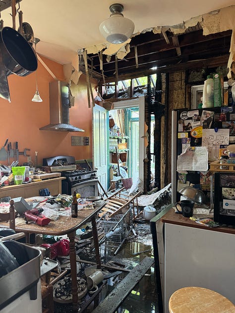 Six photos, three of interior fire damage, two of ongoing repairs, and one of a stack of flooring. 