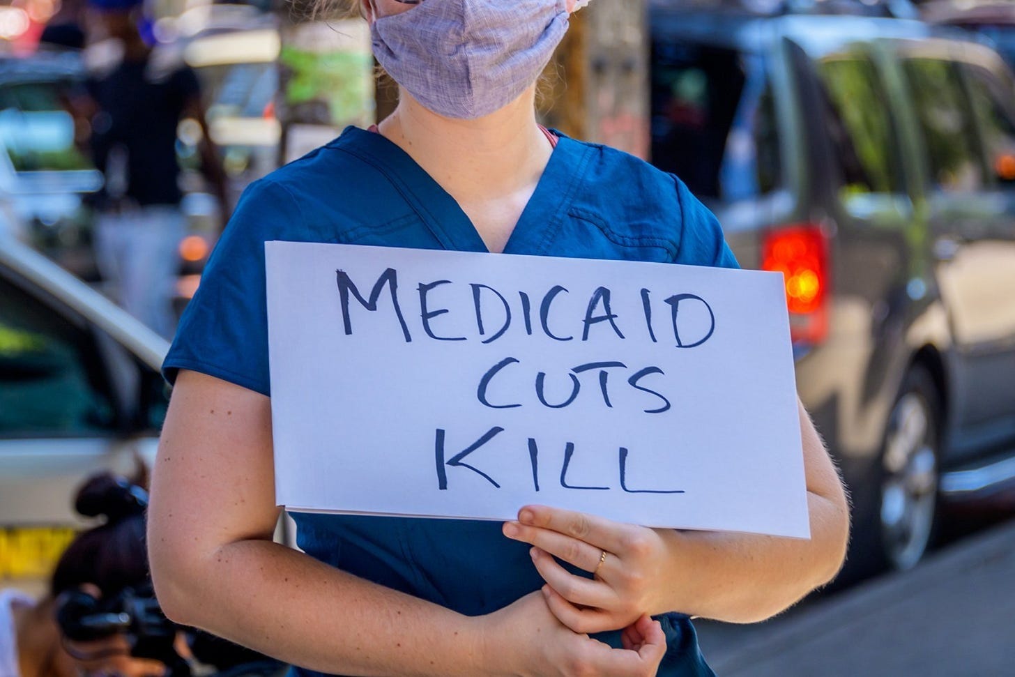 Participant holding a Medicaid Cuts Kill sign at a rally in Brooklyn, N.Y. (Photo by Erik McGregor/LightRocket via Getty Images) Participant holding a Medicaid Cuts Kill sign at a rally in Brooklyn, N.Y. (Photo by Erik McGregor/LightRocket via Getty Images)