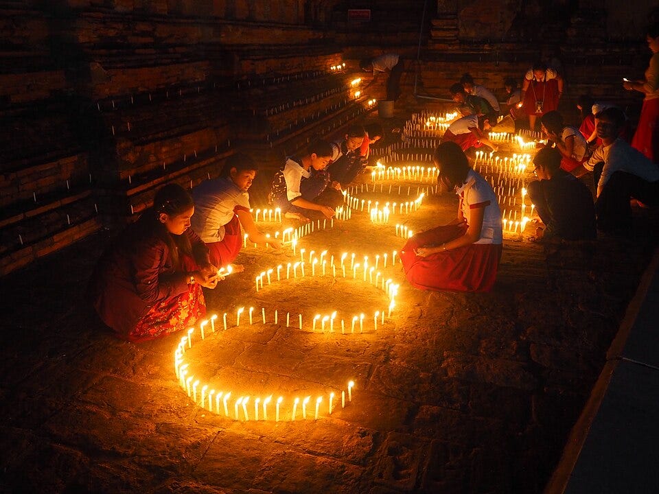 For three nights, houses, pagodas, streets, and public buildings in every corner of Myanmar were illuminated with candles, lanterns, and decorative lights. This festival commemorates the event of Devorohana, the return of the Buddha from the Tavatimsa Heaven to Earth after delivering teachings to His mother. For three nights, houses, pagodas, streets, and public buildings in every corner of Myanmar were illuminated with candles, lanterns, and decorative lights. This festival commemorates the event of Devorohana, the return of the Buddha from the Tavatimsa Heaven to Earth after delivering teachings to His mother.