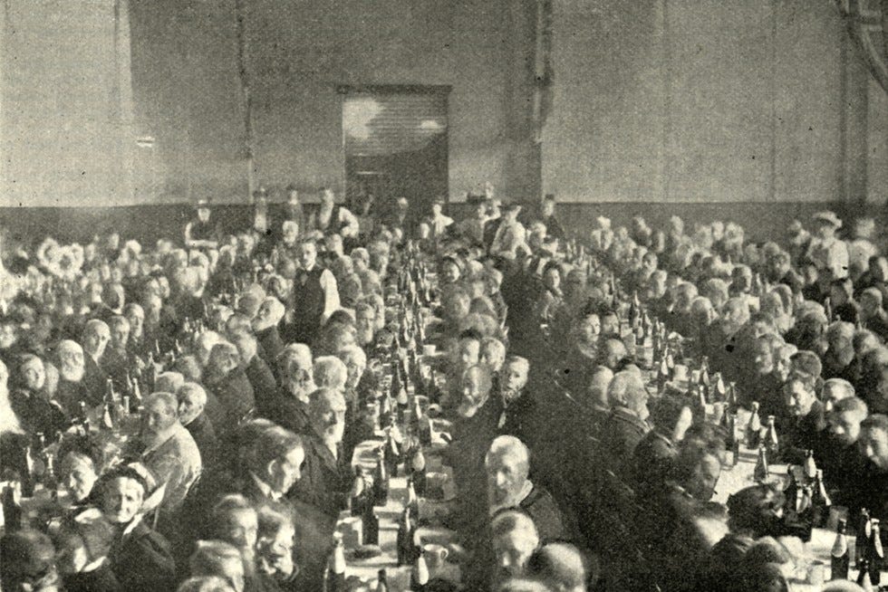 Residents of a London workhouse drink beer on their annual outing to West Sussex, 1896. By the 1890s, many inmates enjoyed occasional day trips to the countryside or seaside. (Image by Mary Evans Picture Library)
