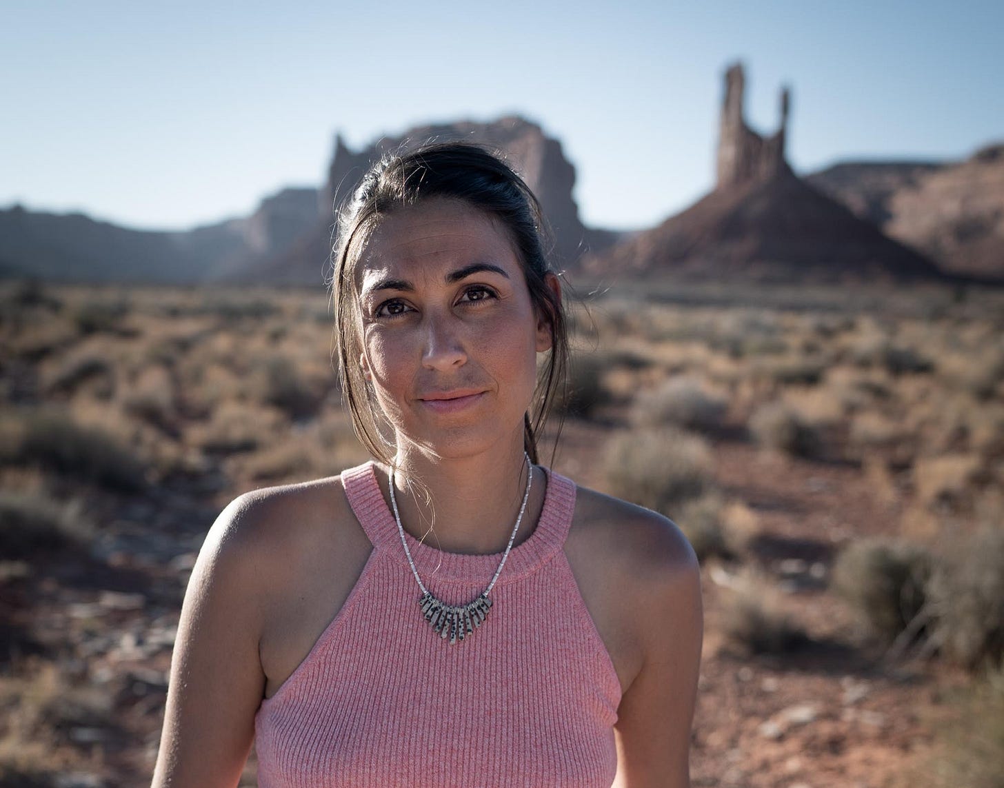 A woman standing outside A woman standing outside