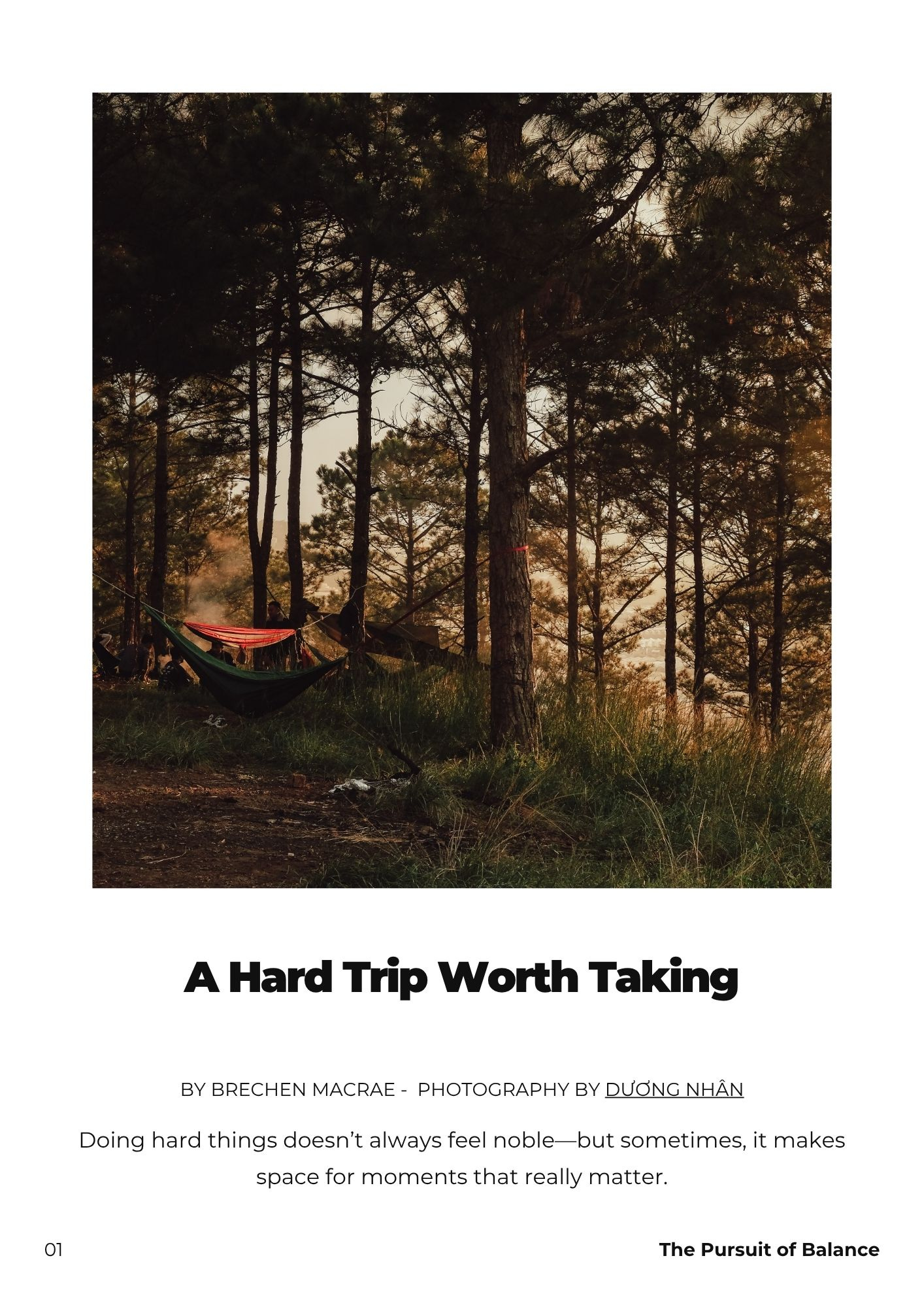 Camping scene at sundown in a dense forest, with hammocks and a tent subtly visible among the trees. Text overlay reads 'July Balance Calendar: Doing Hard Things' with the kicker 'Strength without burnout, growth through effort, presence in discomfort.'