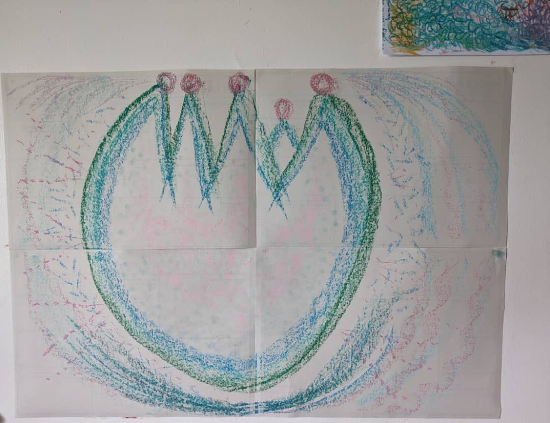 A pastel image that looks like a flower