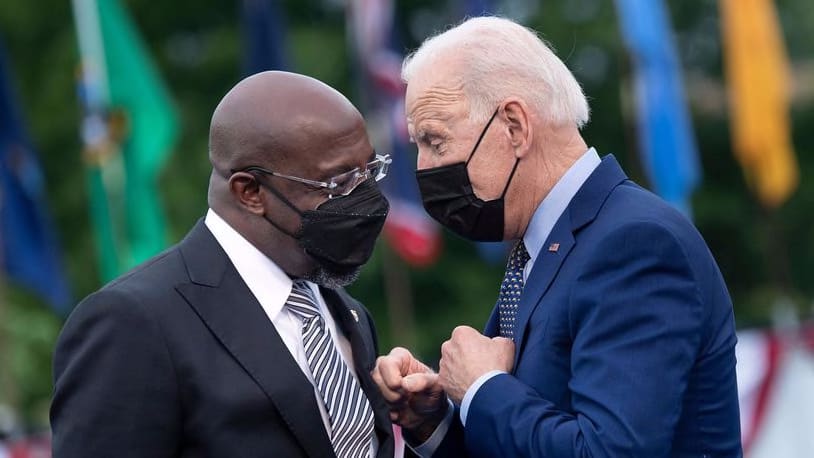 Biden weighs Warnock's proposal to suspend federal gas tax