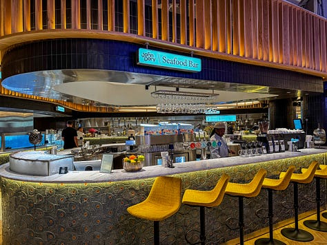 Market Island including Tacos Camino, Kooya Filipino, John Dory Seafood Bar, Wawe coffee, Scarlet's and Gelato Ado