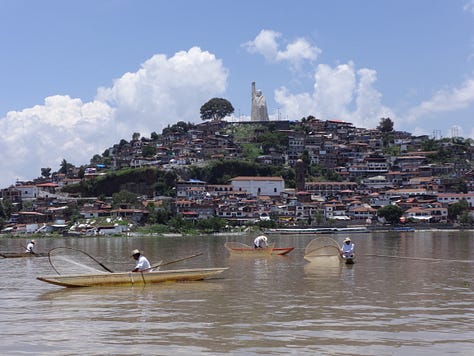 Images of dancing old men, the island by Patzcuaro, and the monument.