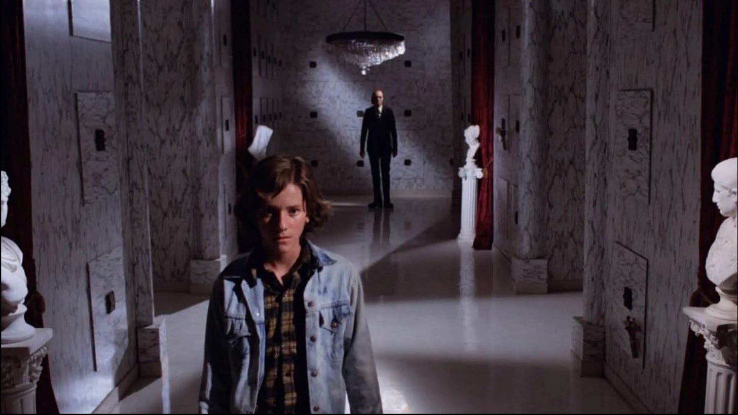 Mike, one of the film’s protagonists, with the Tall Man behind him Mike, one of the film’s protagonists, with the Tall Man behind him