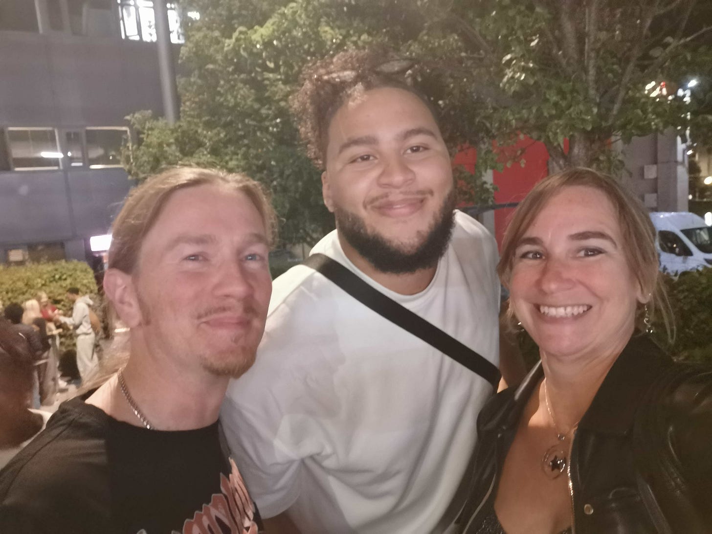 L to R - P M Buchan, Billy Nevers, Dr Pamela Buchan, outside Theatre Royal Plymouth