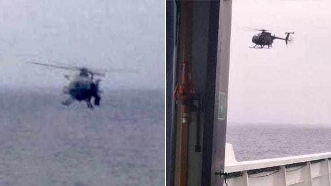 Comp of US helicopter over the tanker