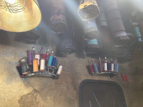 1 & 2: Advertisements on the walls in Disney's Animal Kingdom: Africa; 3 - comms tower in Black Spire Outpost; 4 - Aurebesh chalkboard in Oga's cantina; 5 - Bobbins on a wall in a shop; 6 - mobile toys hanging from a shop ceiling; 7 - Cinderella fountain in Fantasyland; 8 - Stone covered with Norse runes in EPCOT; 9 - pictures embedded in the paving stones in DAK