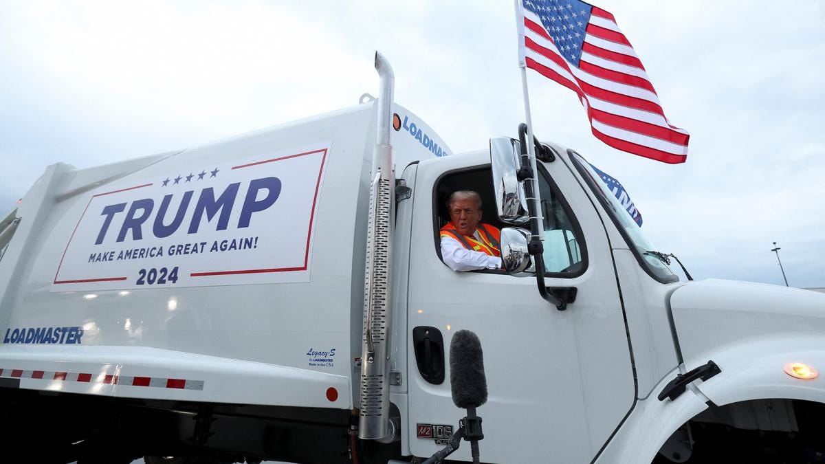 Donald Trump boards a garbage truck to draw attention to Biden remark ...
