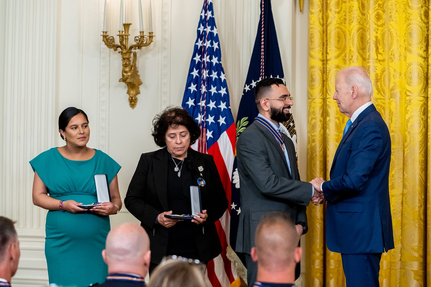 President Biden awards the Medal of Valor. President Biden awards the Medal of Valor.
