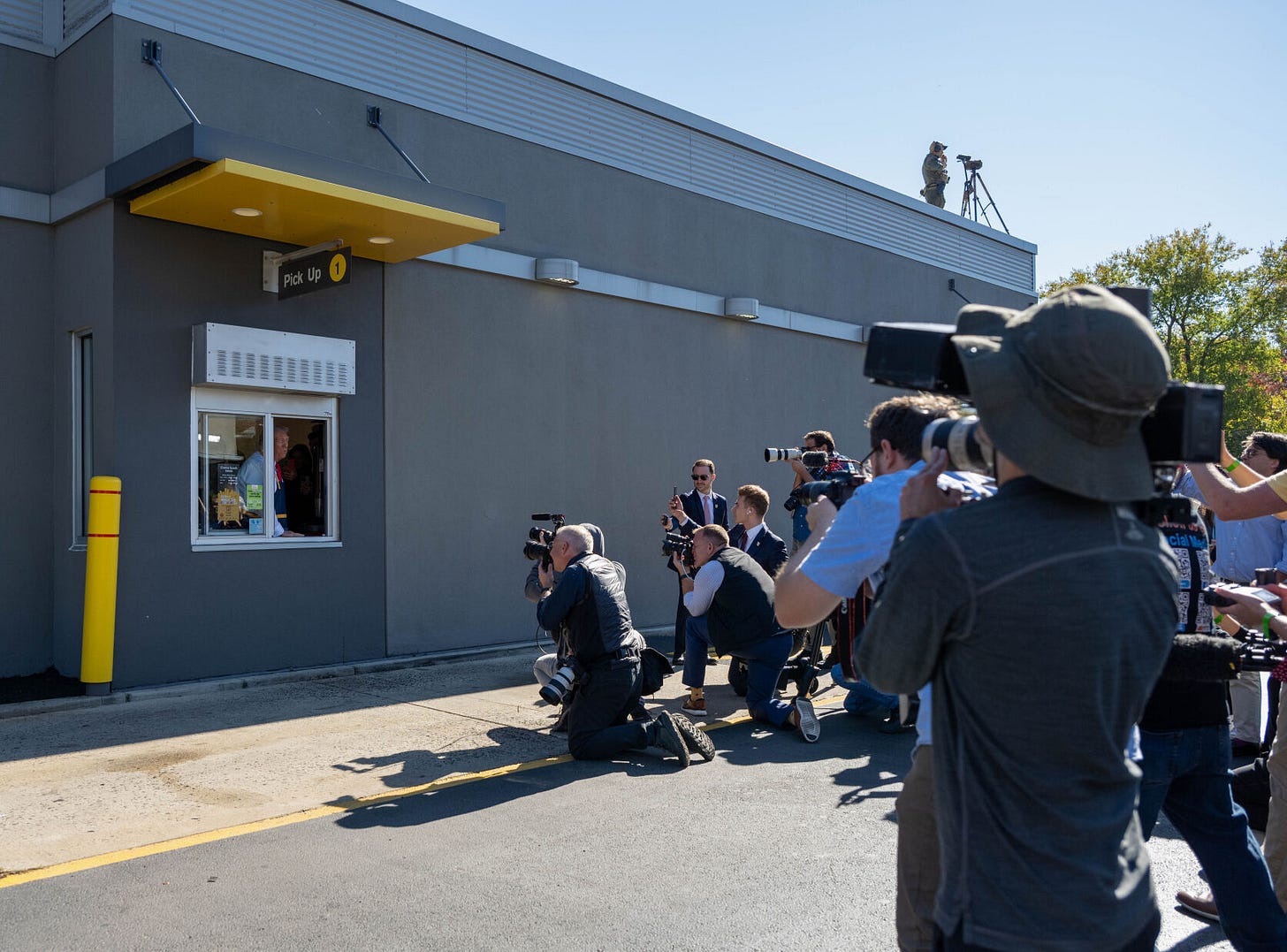 Bucks County Herald freelance photographer Sara Pinkus via Field of View captures the media free-for-all outside on Sunday, October 20, 2024, at a McDonald's in Feasterville-Trevose, Pennsylvania. Bucks County Herald freelance photographer Sara Pinkus via Field of View captures the media free-for-all outside on Sunday, October 20, 2024, at a McDonald's in Feasterville-Trevose, Pennsylvania.