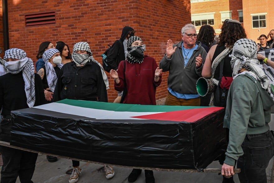 Mark Colville (third from right) stands with Pro-Palestinian activists as they protested the presence, of Amar Ben-Gvir, the Israeli Minister of National Security, who was set to give a speech at Yale's John C. Anderson House on April 23rd, 2025. Mark Colville (third from right) stands with Pro-Palestinian activists as they protested the presence, of Amar Ben-Gvir, the Israeli Minister of National Security, who was set to give a speech at Yale's John C. Anderson House on April 23rd, 2025.