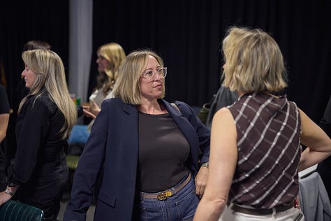 Photos of Lauren and Beth on stage at our latest Accelerator workshop, as well as photos of attendees chatting at the event.