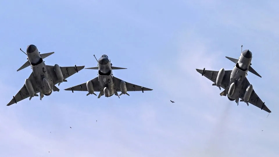 Pakistan Air Force J-10 fighter jets fly past over the President's House during the national day parade in Islamabad on March 23, 2025. - Aamir Qureshi/AFP/Getty Images Pakistan Air Force J-10 fighter jets fly past over the President's House during the national day parade in Islamabad on March 23, 2025. - Aamir Qureshi/AFP/Getty Images