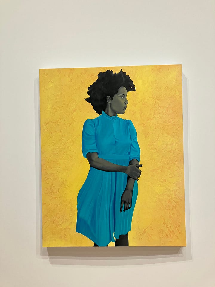 four full-length paintings of Black people in bright outfits against yellow, blue and orange backgrounds.