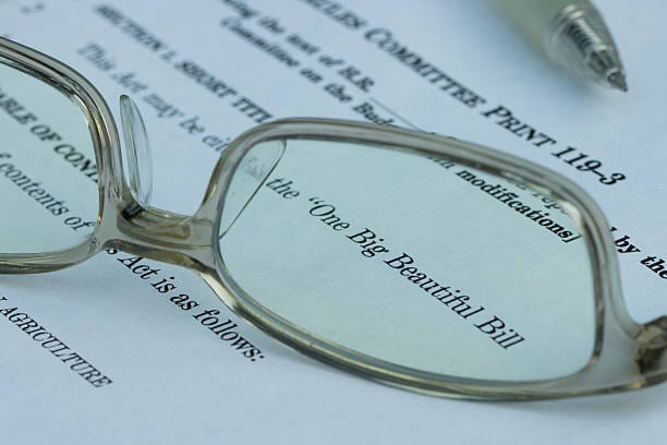 One Big Beautiful Bill Act Closeup of the documents of the One Big Beautiful Bill Act (OBBBA), a budget reconciliation bill in the 119th United States Congress. One Big Beautiful Bill stock pictures, royalty-free photos & images