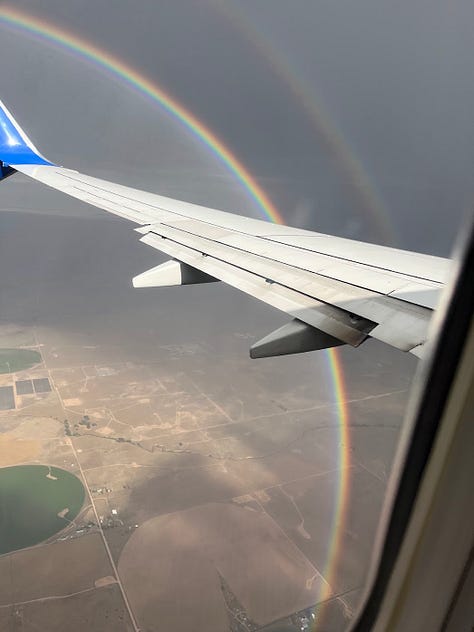 A full-circle double rainbow I saw flying home from California.
