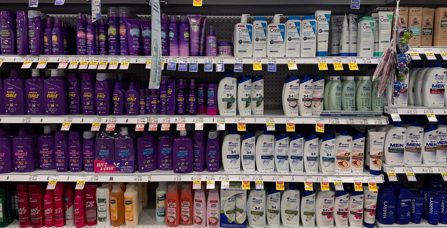4 shelves of shampoo and conditioner with few immediate visual differences 4 shelves of shampoo and conditioner with few immediate visual differences