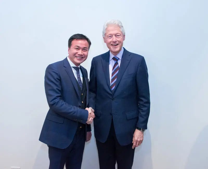 Zhu and Bill Clinton