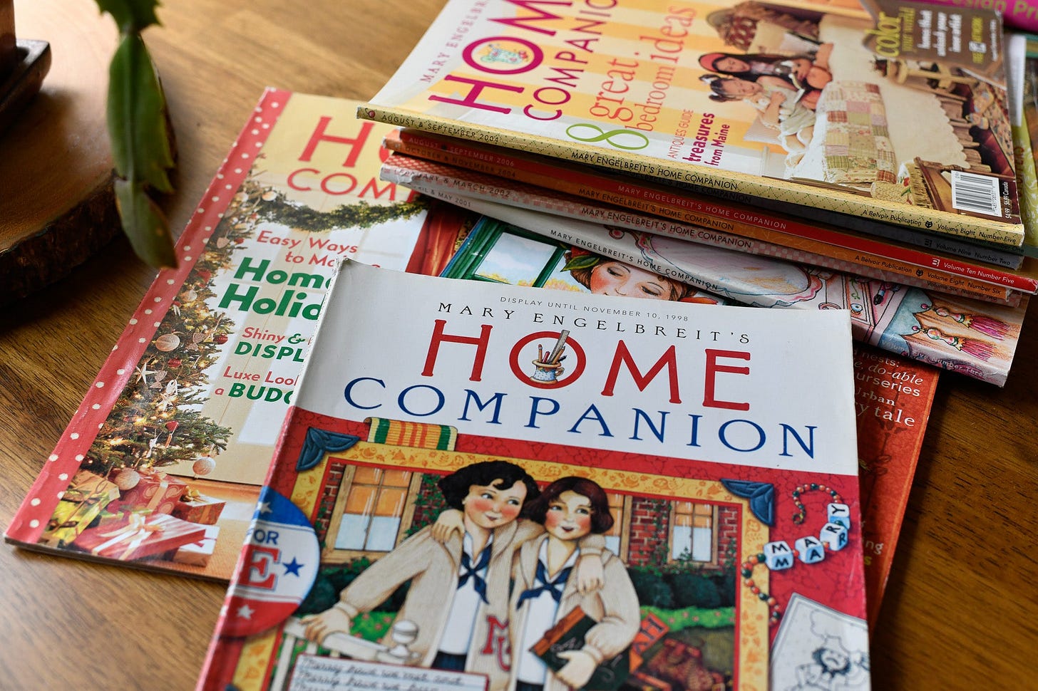 an array of Mary Engelbreit magazines on a table