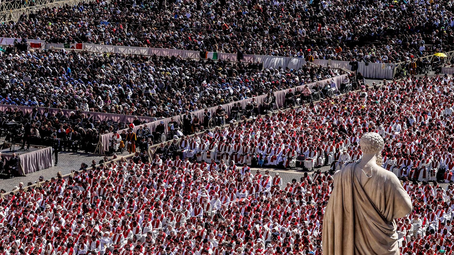 Roles of thousands attend funeral Roles of thousands attend funeral