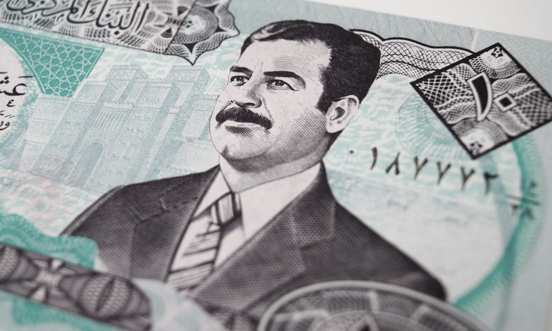a portrait of a man on a five dollar bill