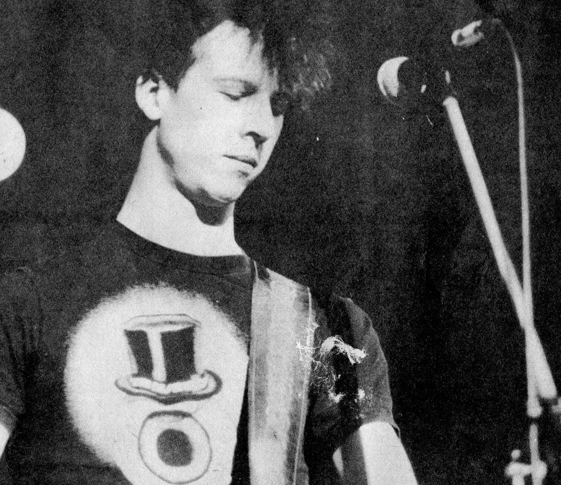 Nigel from Half Man Half Biscuit on stage. He’s wearing a Residents T-shirt.